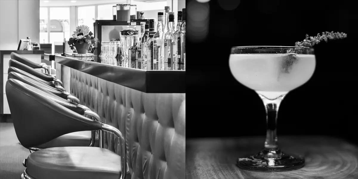 Bar mit Stuehlen und Nahaufnahme eines Cocktails