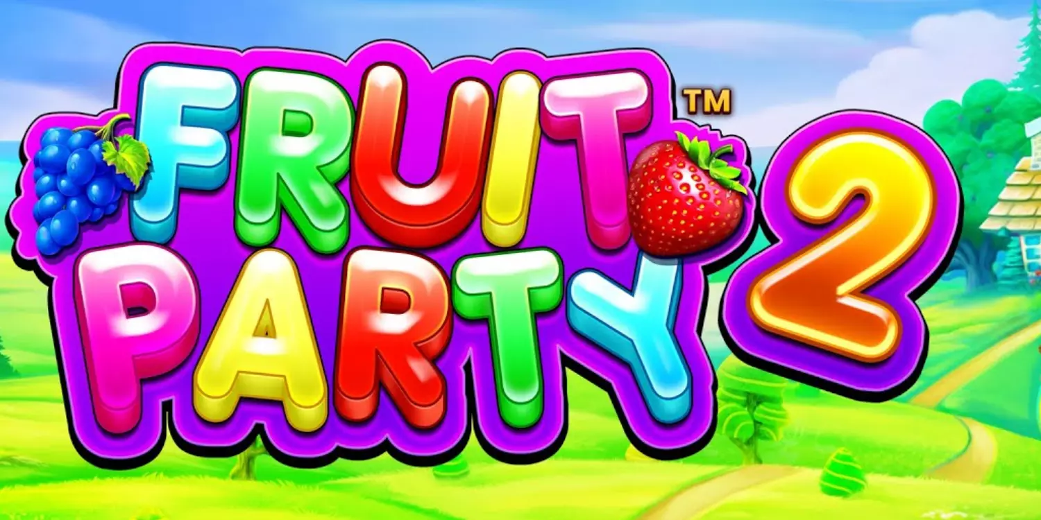 Der bunte Fruit Party 2 Schriftzug auf einer Wiese im Hntergrund. 