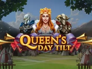 Die Königin zwischen den Rittern hinter dem Queens Day Tilt Schriftzug.