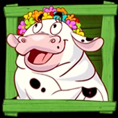 Lächelnde weiße Kuh mit Blumenkette im grünen Holzrahmen
