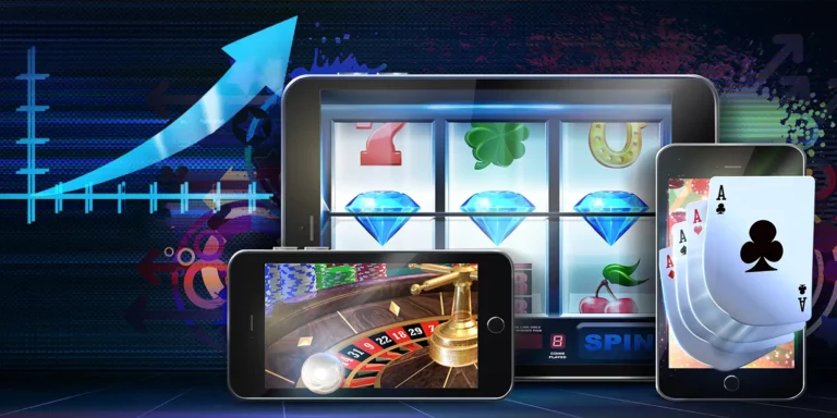 Tablet und Smartphones mit diversen Casino-Spielen wie Slots, Poker oder Roulette auf den Screens